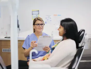patient-and-dentist-discussion.webp